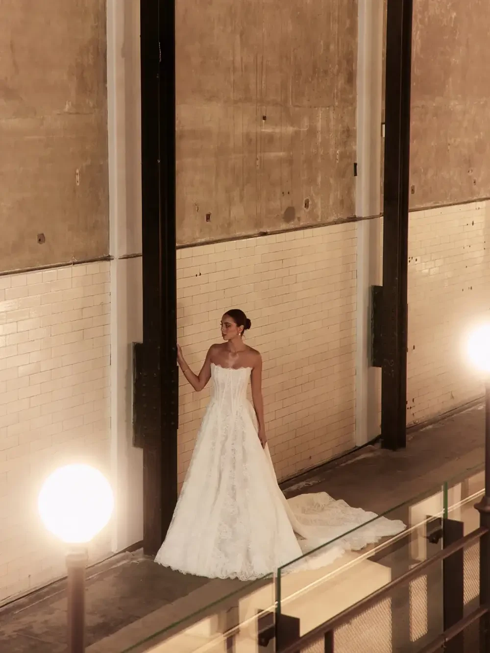 model is wearing a strapless bridal gown
